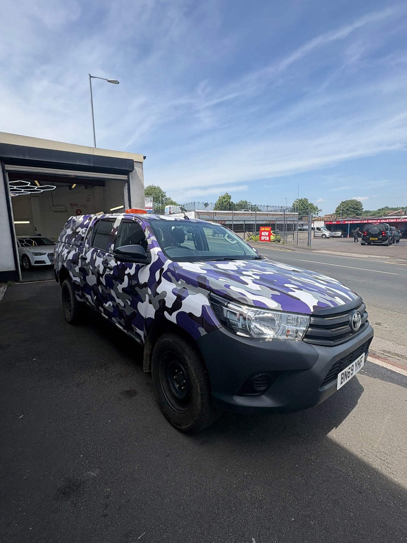 Camouflage pickup vehicle wrap